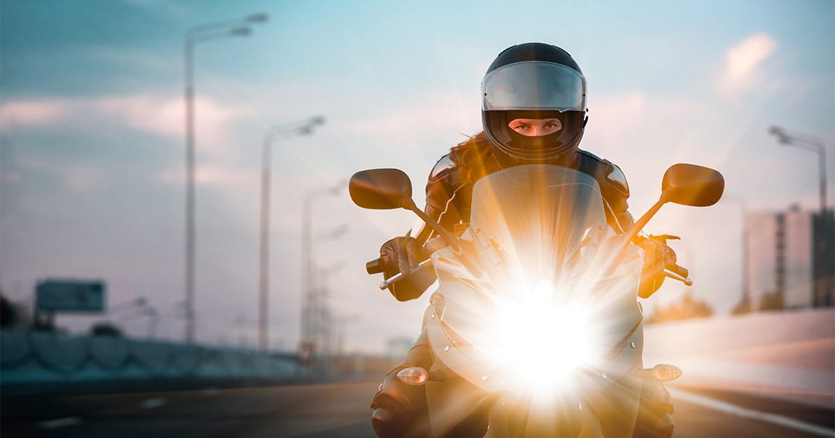 Motorcycle Driving Down a Highway