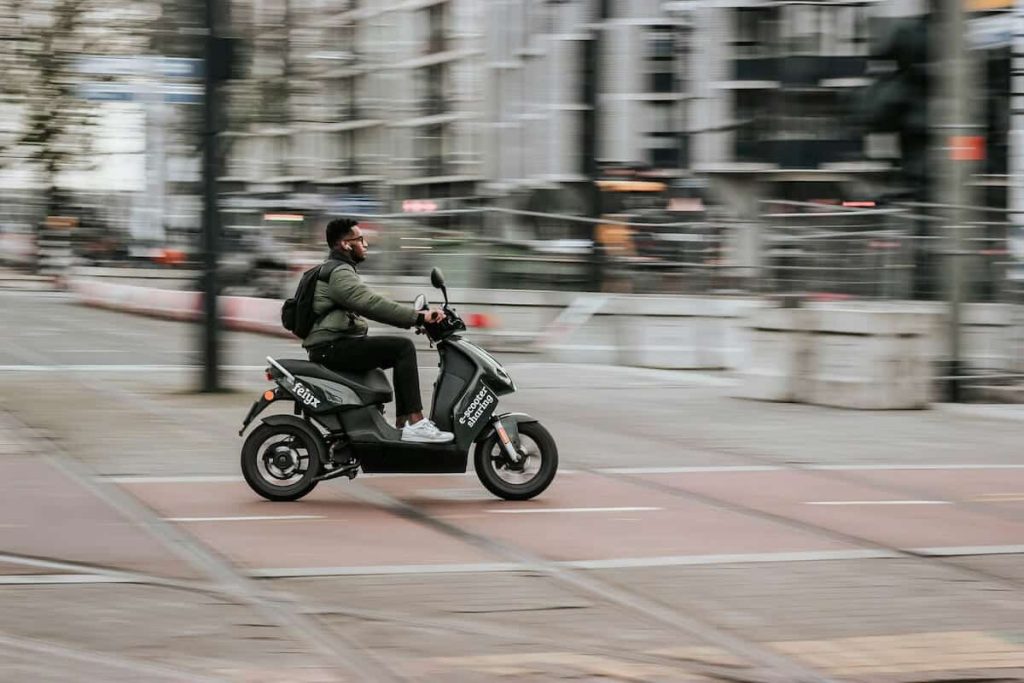 Photo of a man on scooter