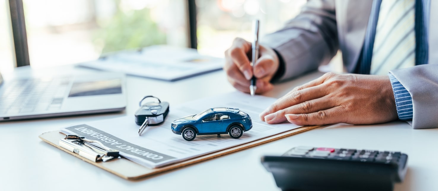 Signing Document Man Signing Documents With Small Toy Car Over It
