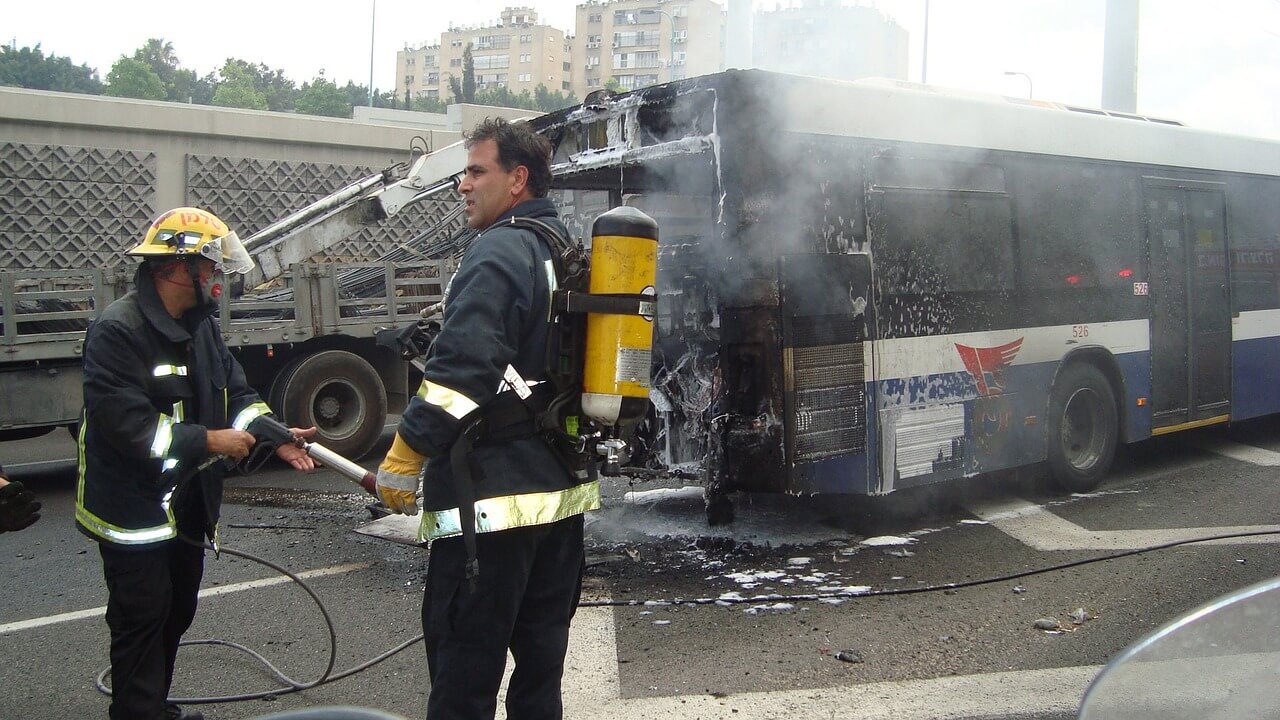 Firefighters in the street for a bus accident